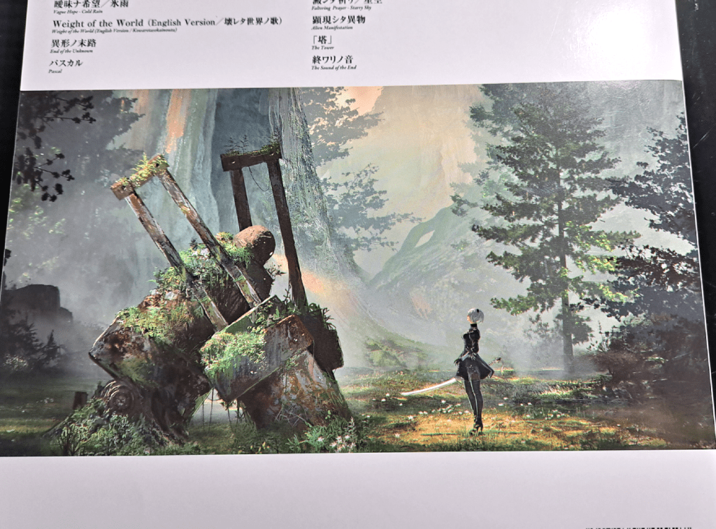 Back cover color image of 2B (right) in the Forest Zone with a mossy automaton (left)