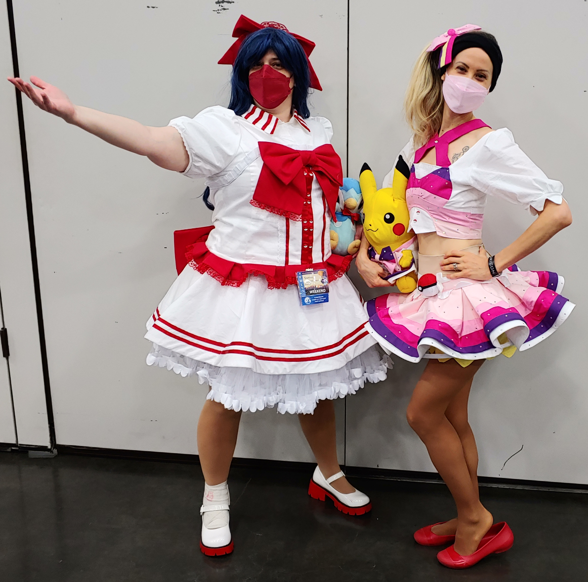 May and Dawn in contest gear standing together backstage