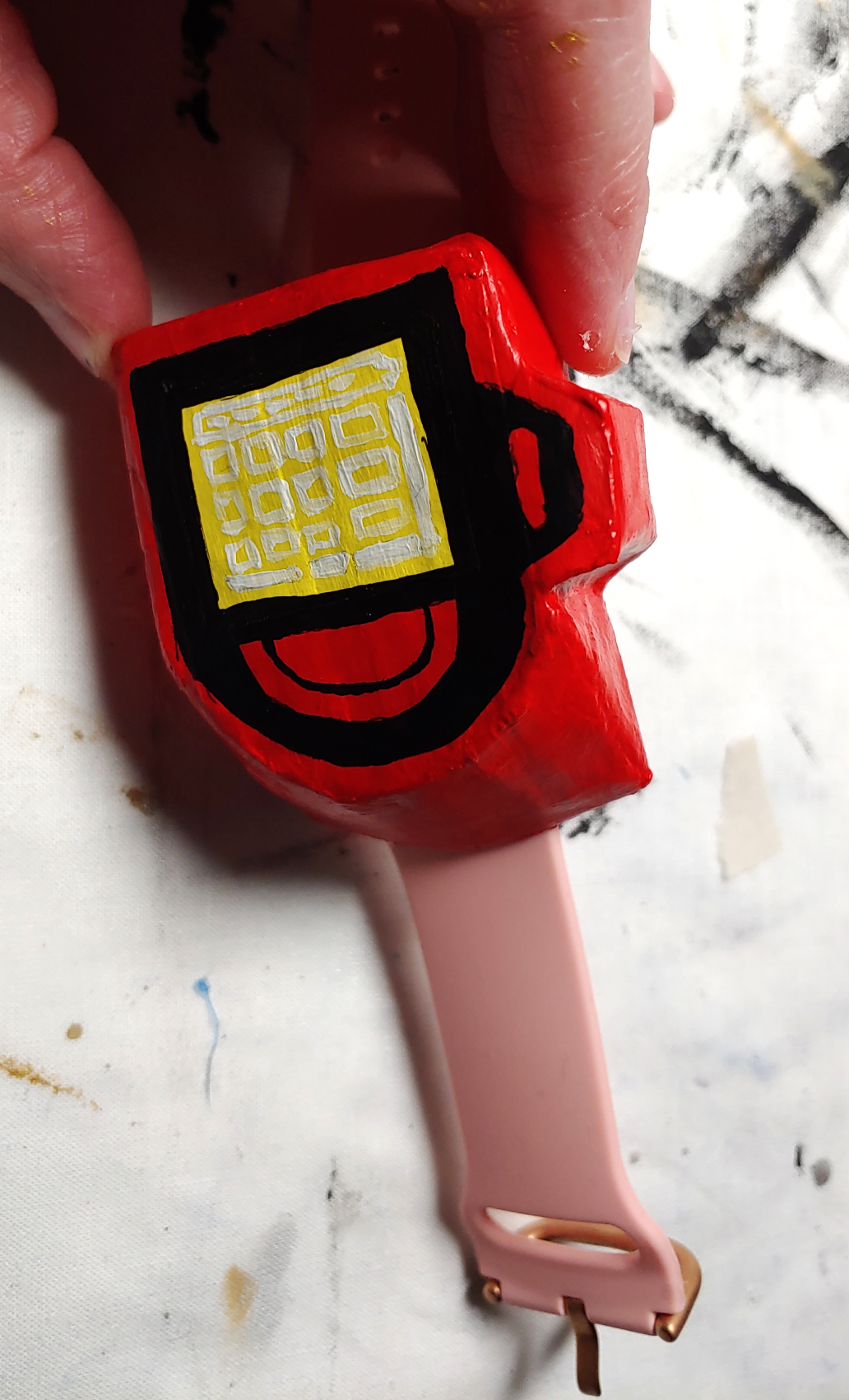 Poketch turned slightly sideways to show the angles on the side.