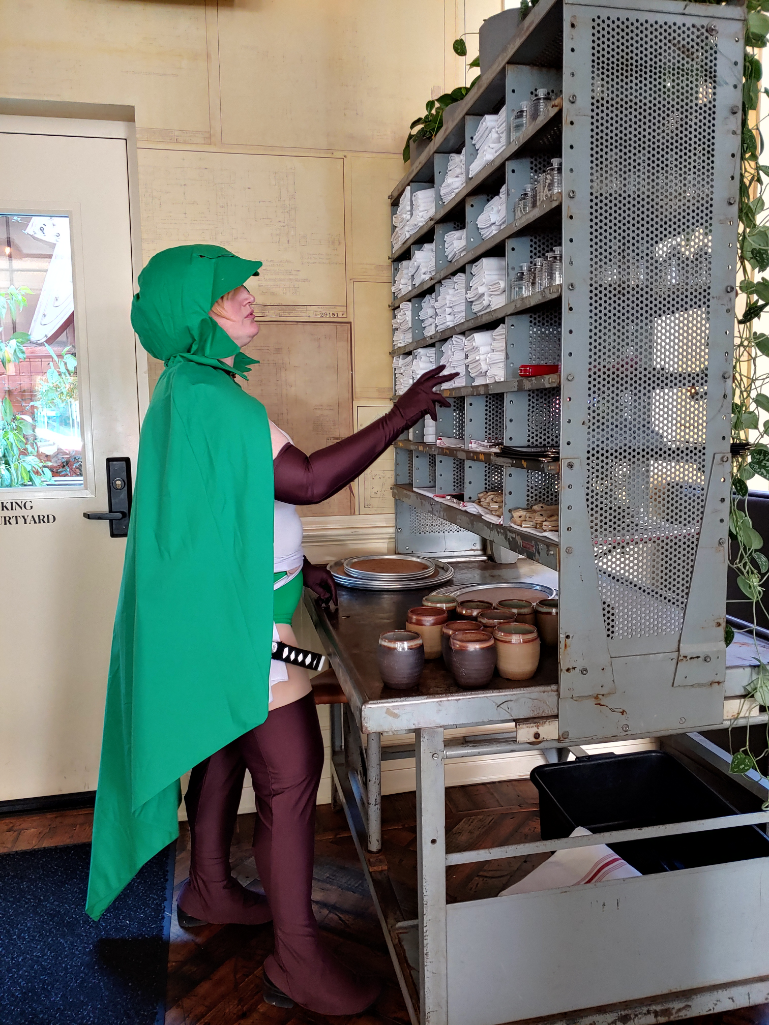 Ryu looking through a selection of cloths to clean the bar with