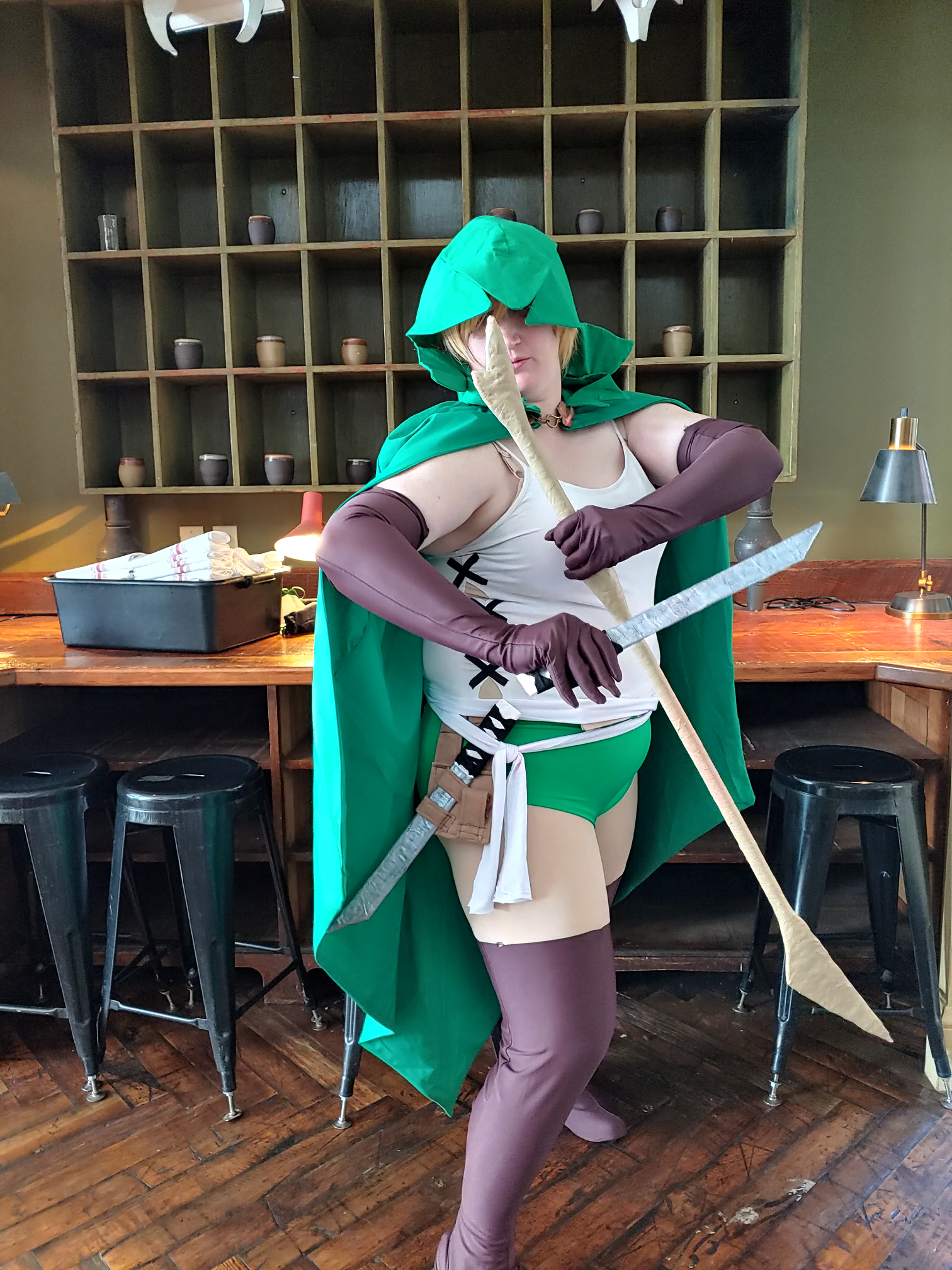 Ryu in battle stance, blade and stick crossed