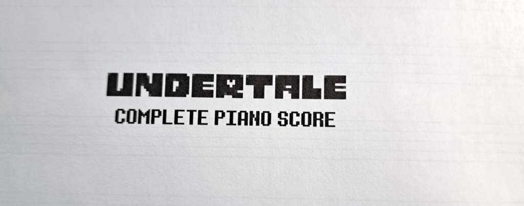 Small title in the back of the book that says "Undertale Complete Piano Score