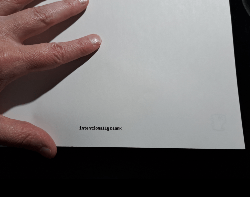Page in the back of the book with small text that says "intentionally blank"