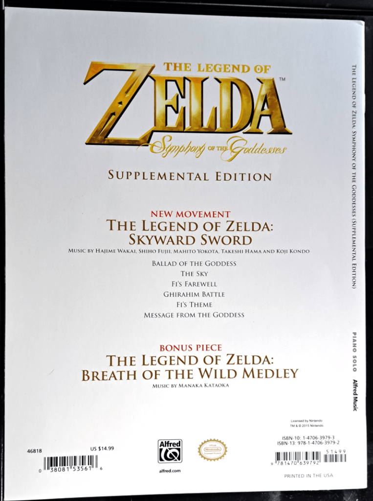 White back cover with "The Legend of Zelda Symphony of the Goddesses Supplemental Edition" written in gold. Below that is the list of movements included in the book