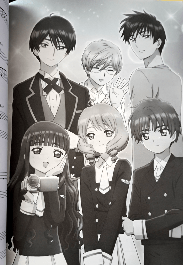 Grayscale artwork insert of the cast.
Back row: Yuna D Kaito, Yukito, and Touya
Front row: Tomoyo, Akiho, and Syaoran