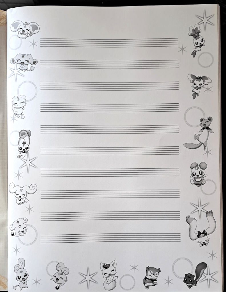 Blank music score with all the fairies, mascots, and familiars in the border.