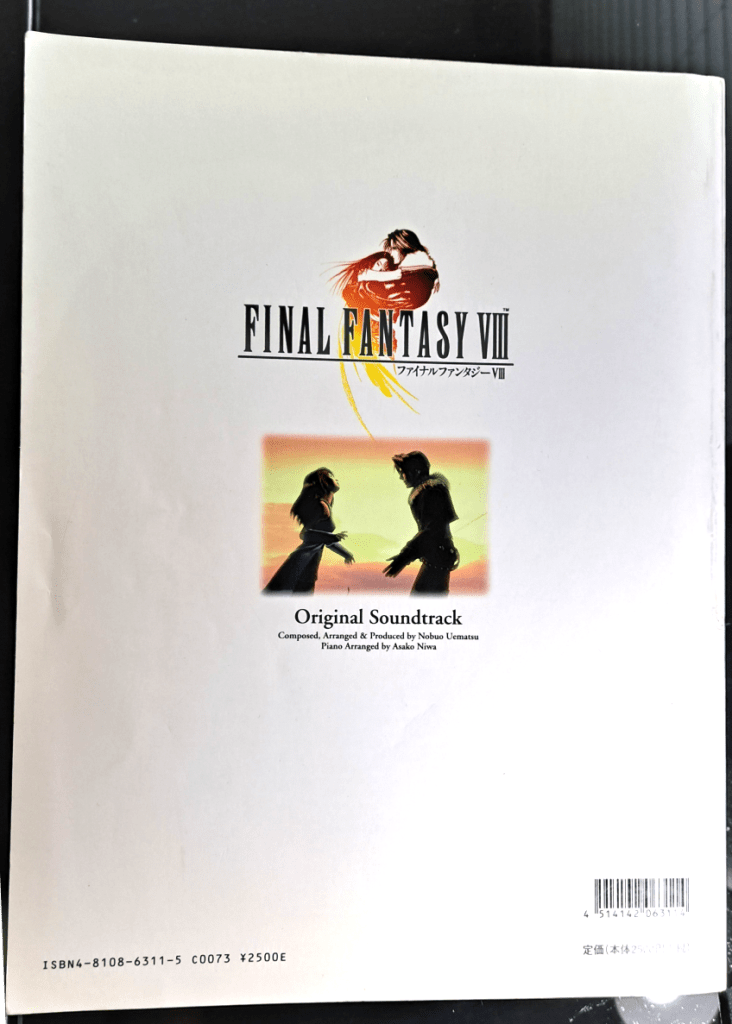 Mostly white back cover with "Final Fantasy VIII" and Amano art of Squall and Rinoa embracing on the top.
Below is a render of Rinoa and Squall leaping into each others' arms against a sunset with "Original Soundtrack" below it.