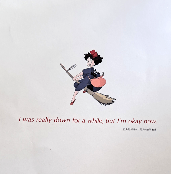 Back cover with Kiki riding her broom with Jiji on her bag. The text says "I was really down for a while, but I'm okay now."
