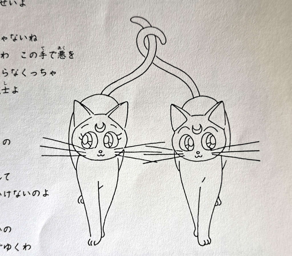 Line art of Luna (left) and Artemis (right) walking with intertwined tails